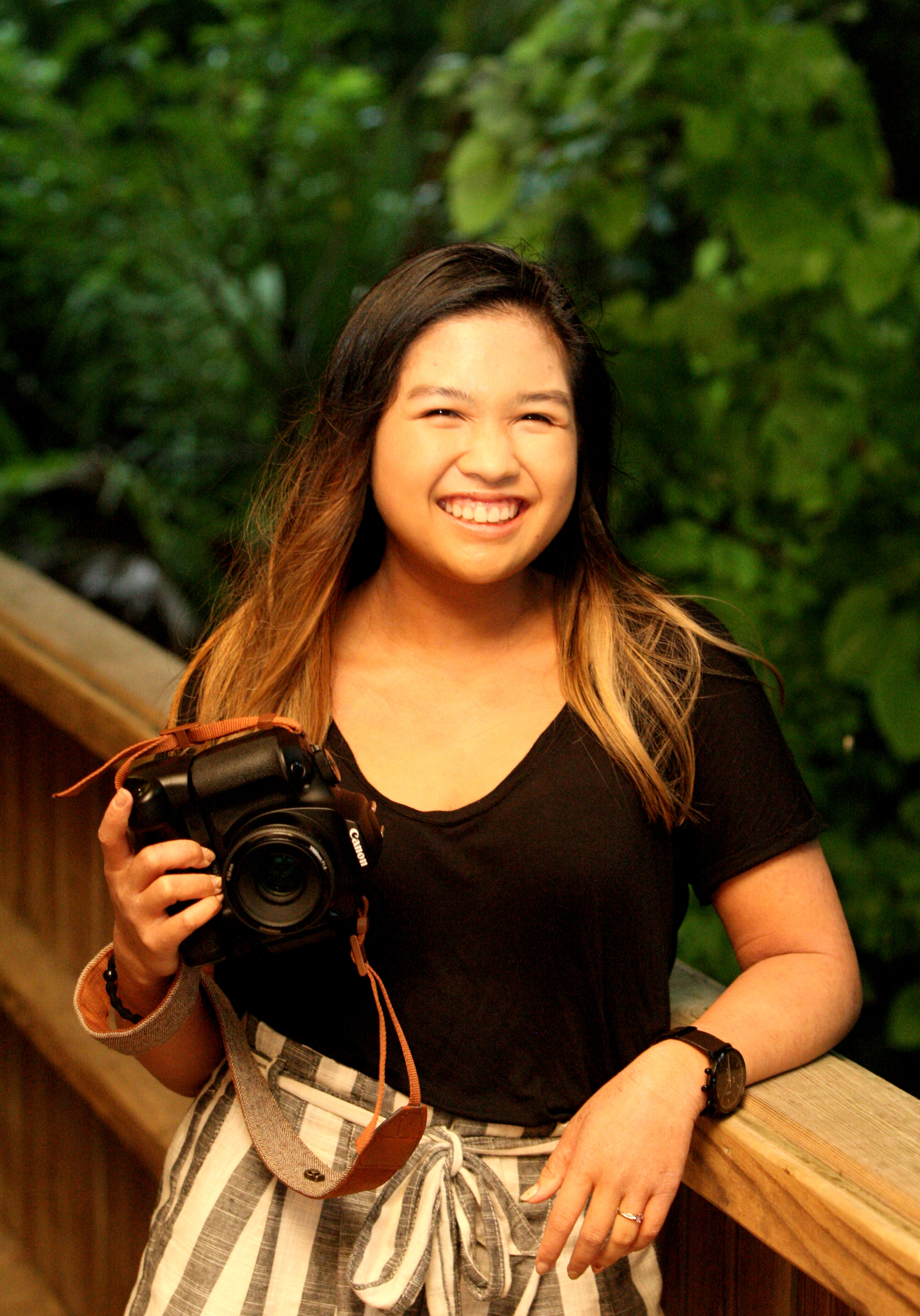 08/01/19- Melbourne, Fl -- Photo by Christina Stuart/Christina Stuart Photography- EB LEMONADE STAND KAILA — Kayla Taylor, 15, poses at the FIT Botanical Gardens in Melbourne on Thursday, August 1, 2019. Taylor is a certified doula and has been photographing births with her mother, also a doula, for 2 years. She expanded into family and baby portraits.